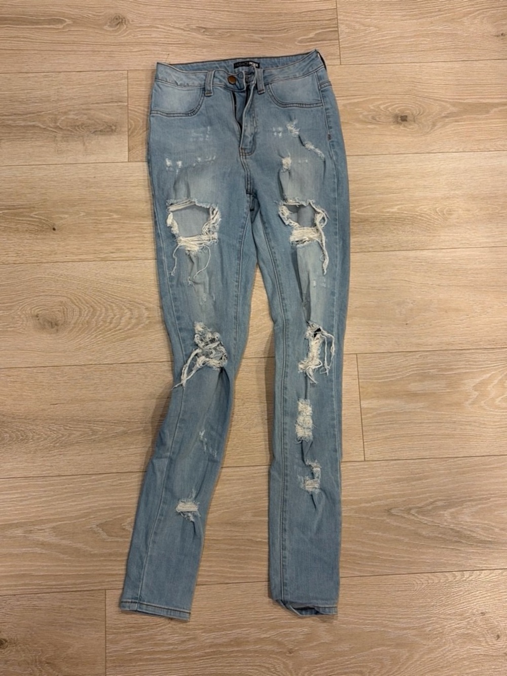 Fashion Nova Light Blue Ripped Skinny Jeans